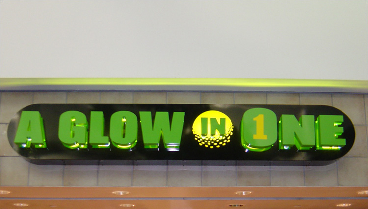A Glow in One  Custom Halo Lit Channel Letters Sign