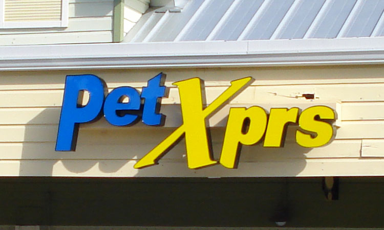 Pet Xprs Channel Letters on a Raceway Building Sign